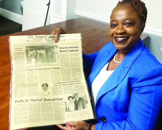 Phyllis Tufts Hightower holds a 1983 copy of The Jones County News that features an article about her father, and she is also in the photo. CONTRIBUTED